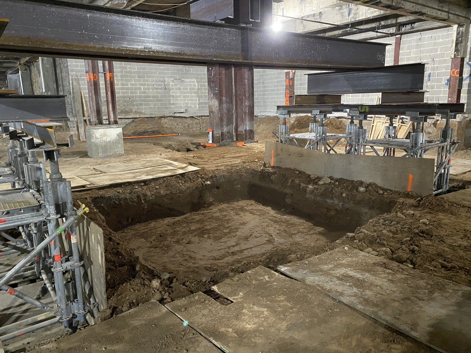 Structural shoring and foundation work under an operating asset